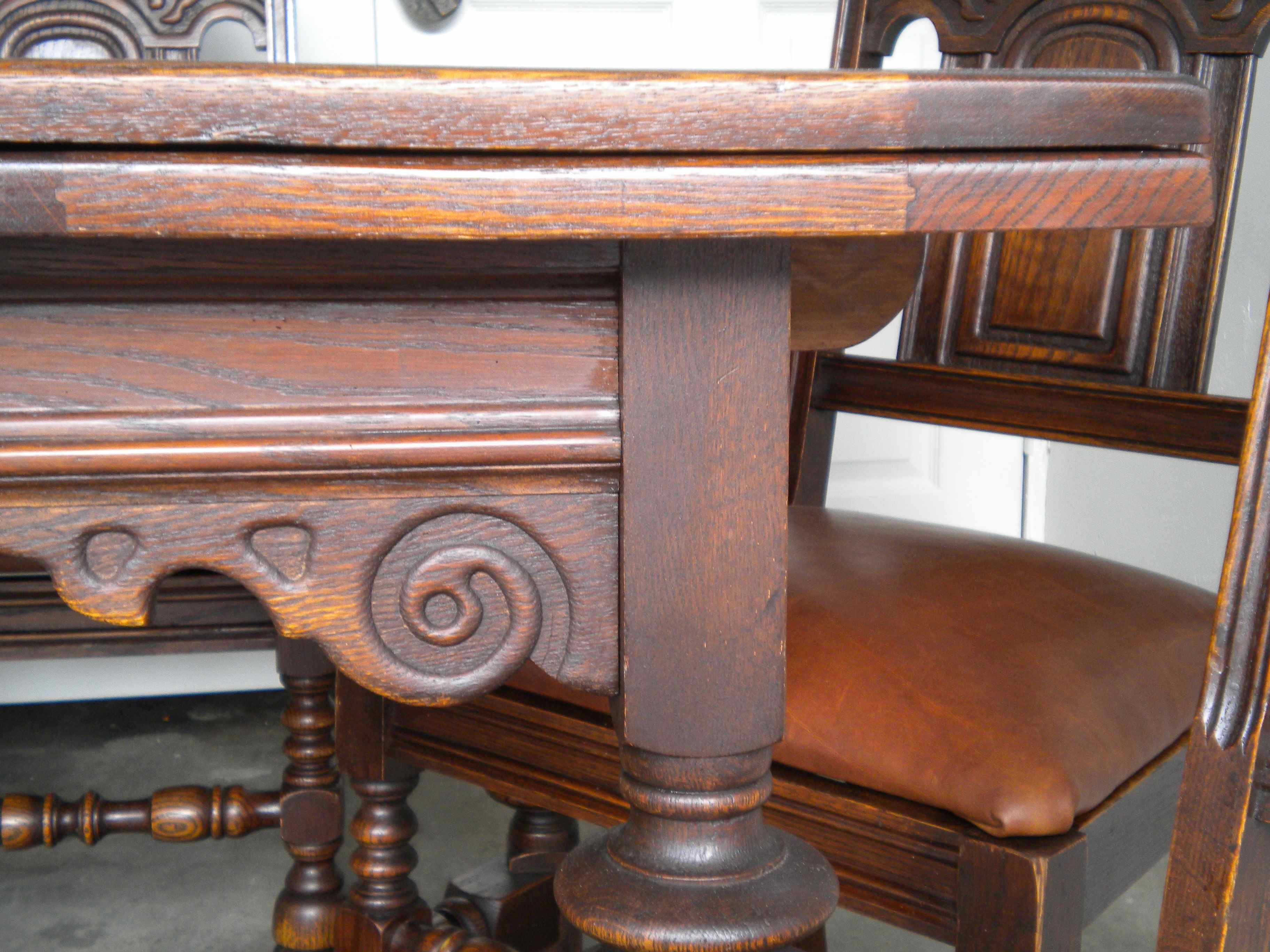 Antique English Oak Dining Table and 6 chairs with leather bottoms